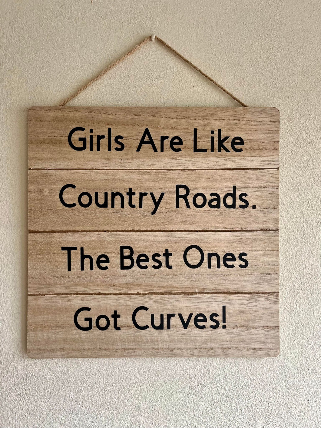 Girls Are Like Country Roads sign